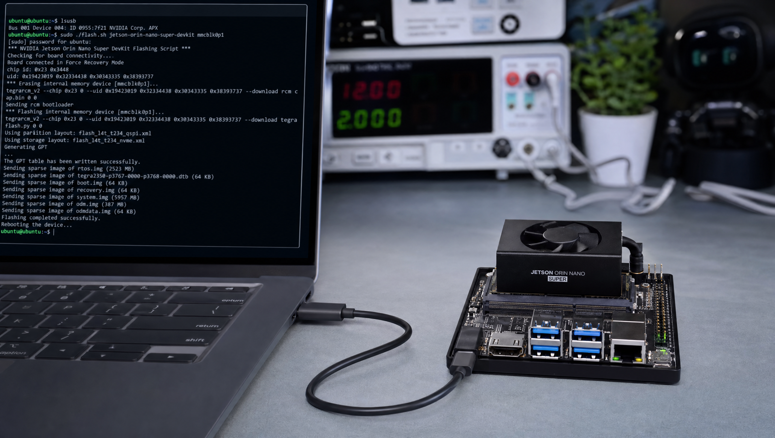 Jetson Orin Nano Super Developer Kit connected to host laptop via USB-C for flashing with terminal showing flash.sh progress